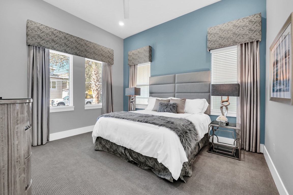 Guest suite in blue and gray with custom drapery and valances