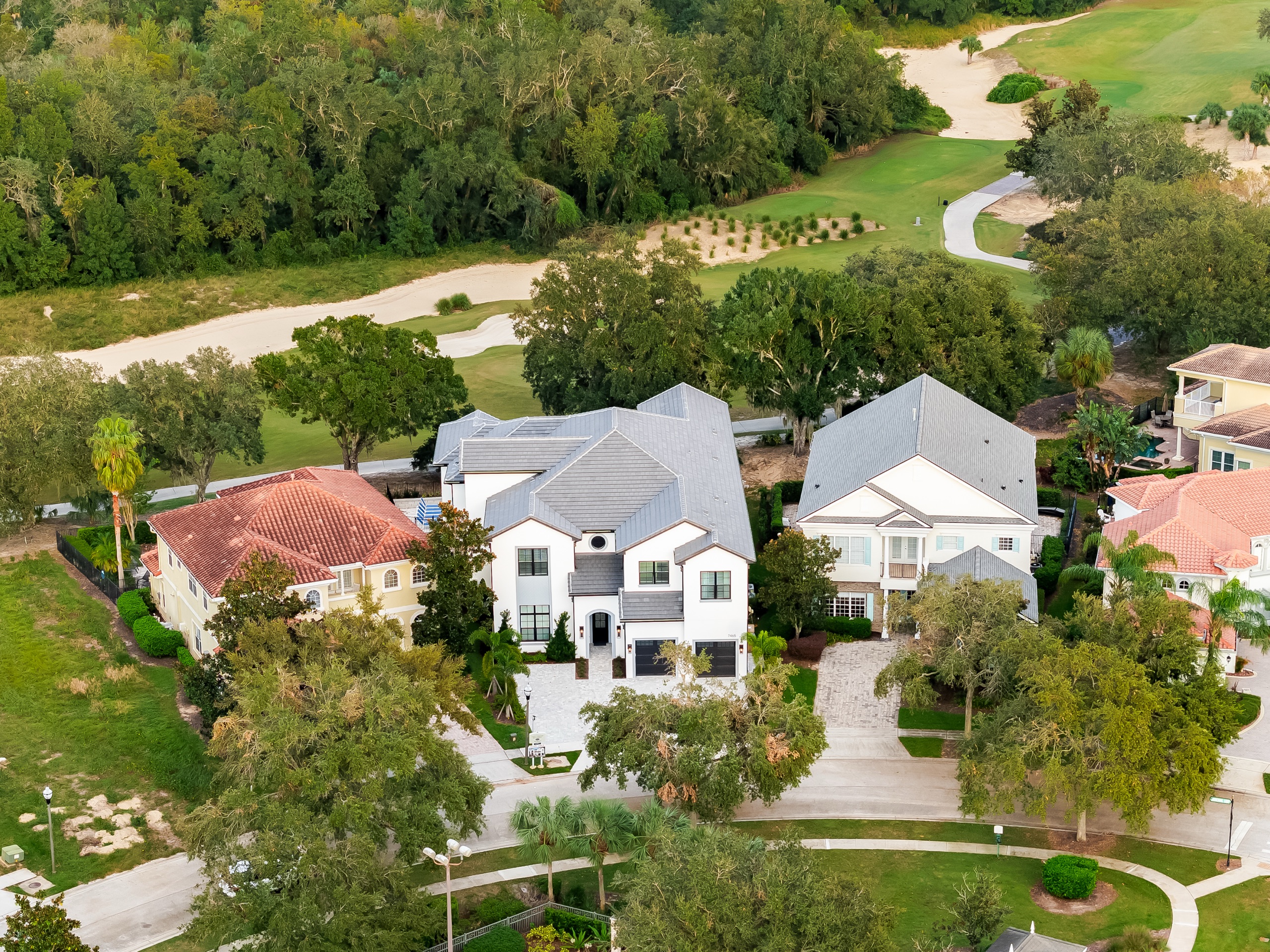 Aerial showing the home set against the championship golf course