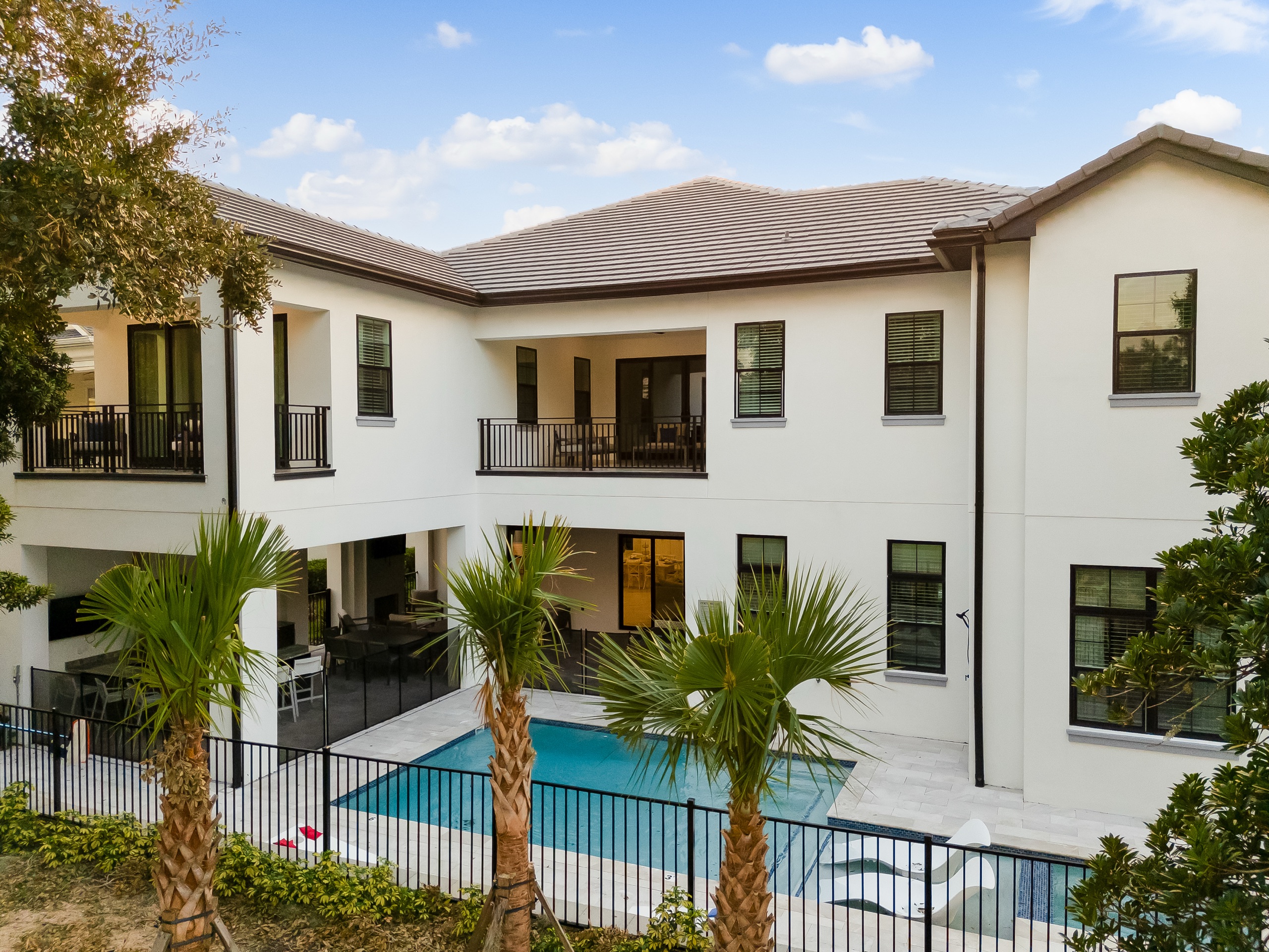 The rear elevation and courtyard pool from the deck