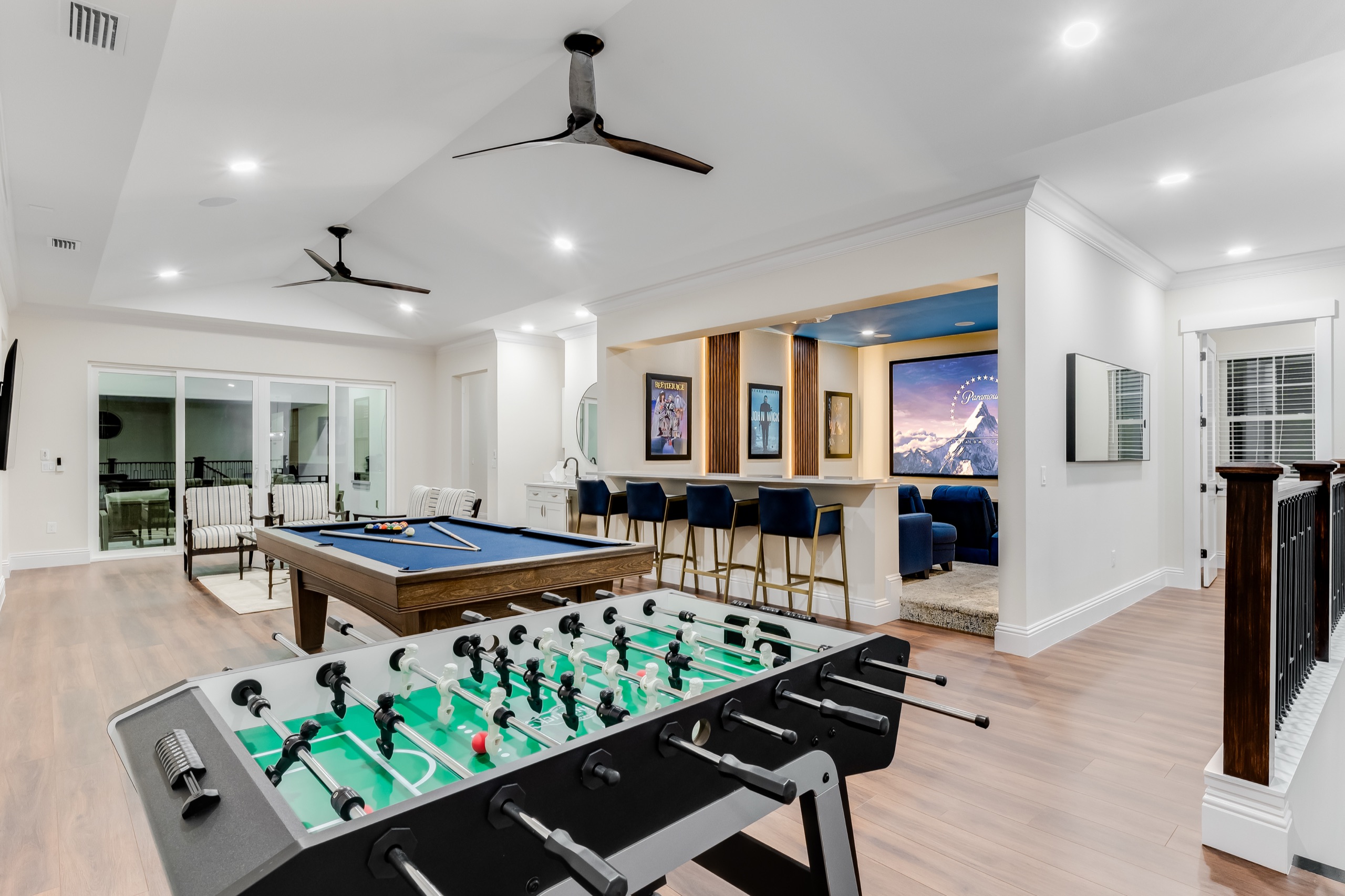 Foosball table on the game floor beneath the projector screen