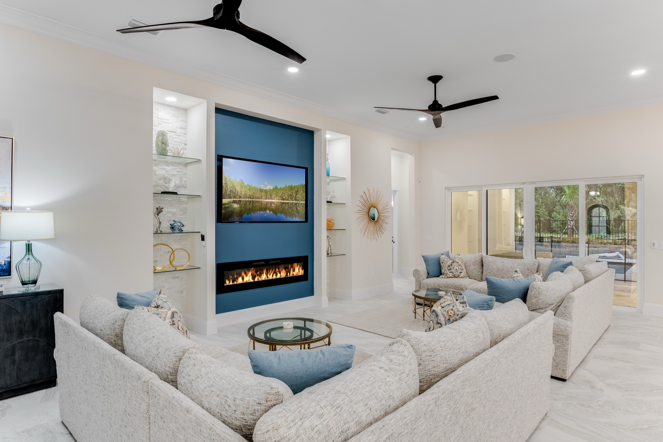 Living room from another angle with the fireplace wall and twin sofas