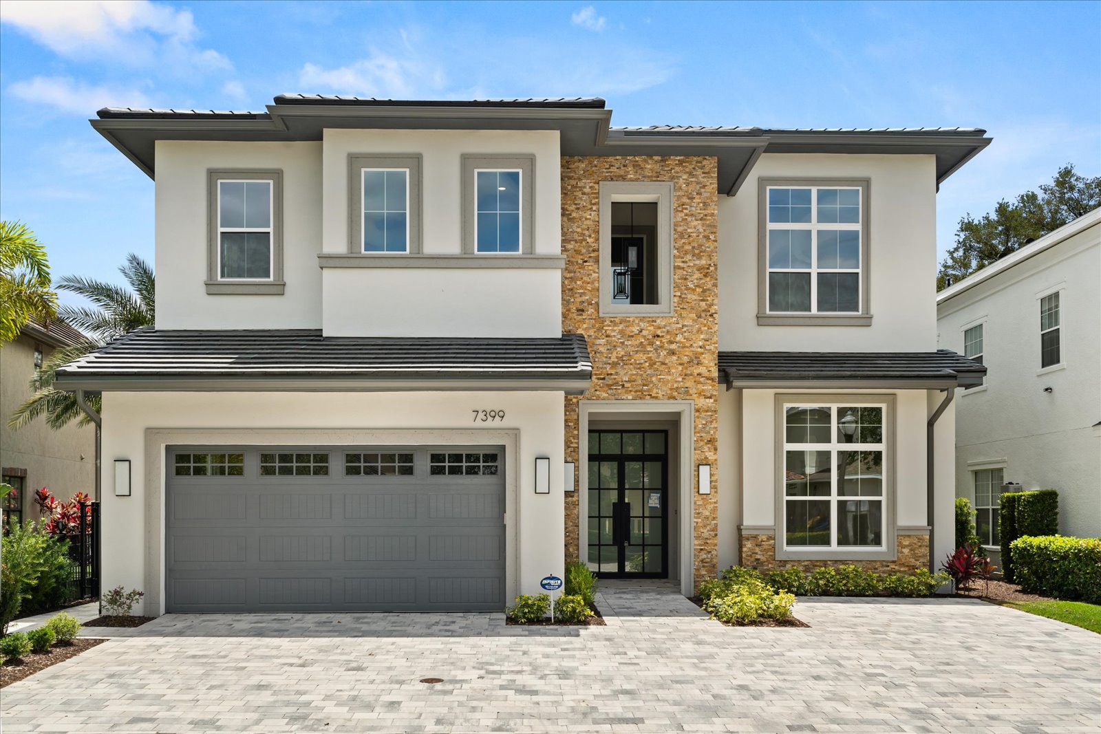 Midway Modern — restrained contemporary elevation by day
