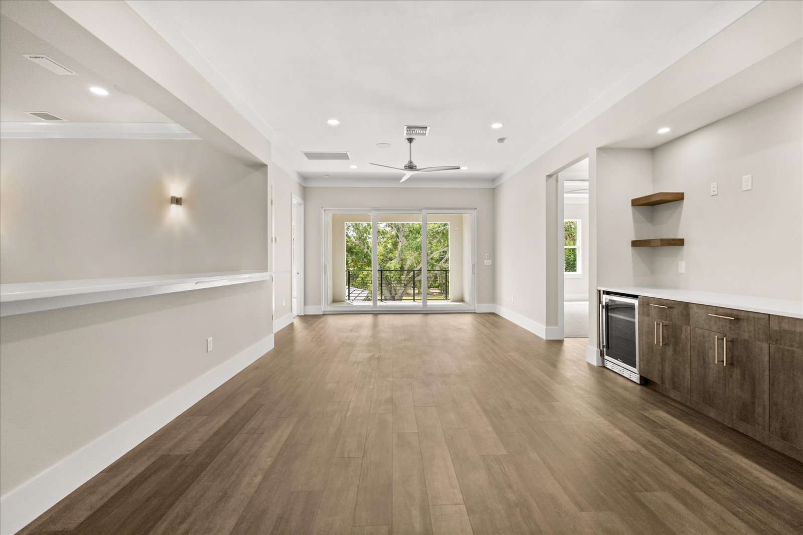 Upstairs loft with a wet bar and a balcony over the fairway
