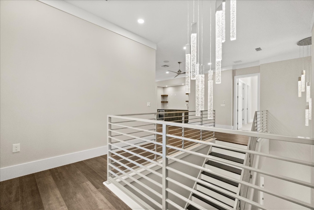Floating stair with linear crystal pendants