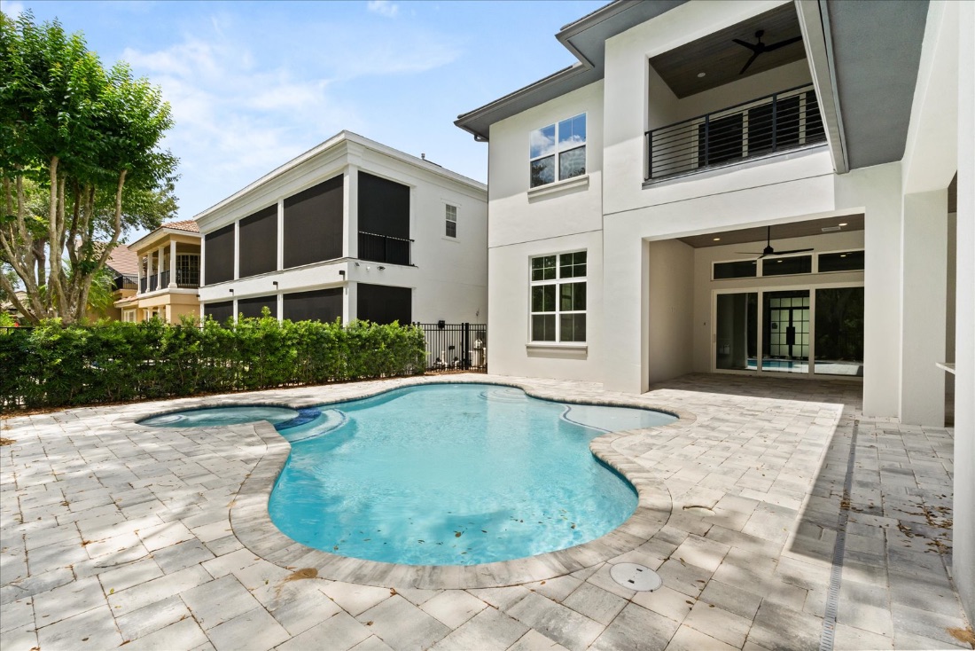 Freeform pool and the two-story rear elevation