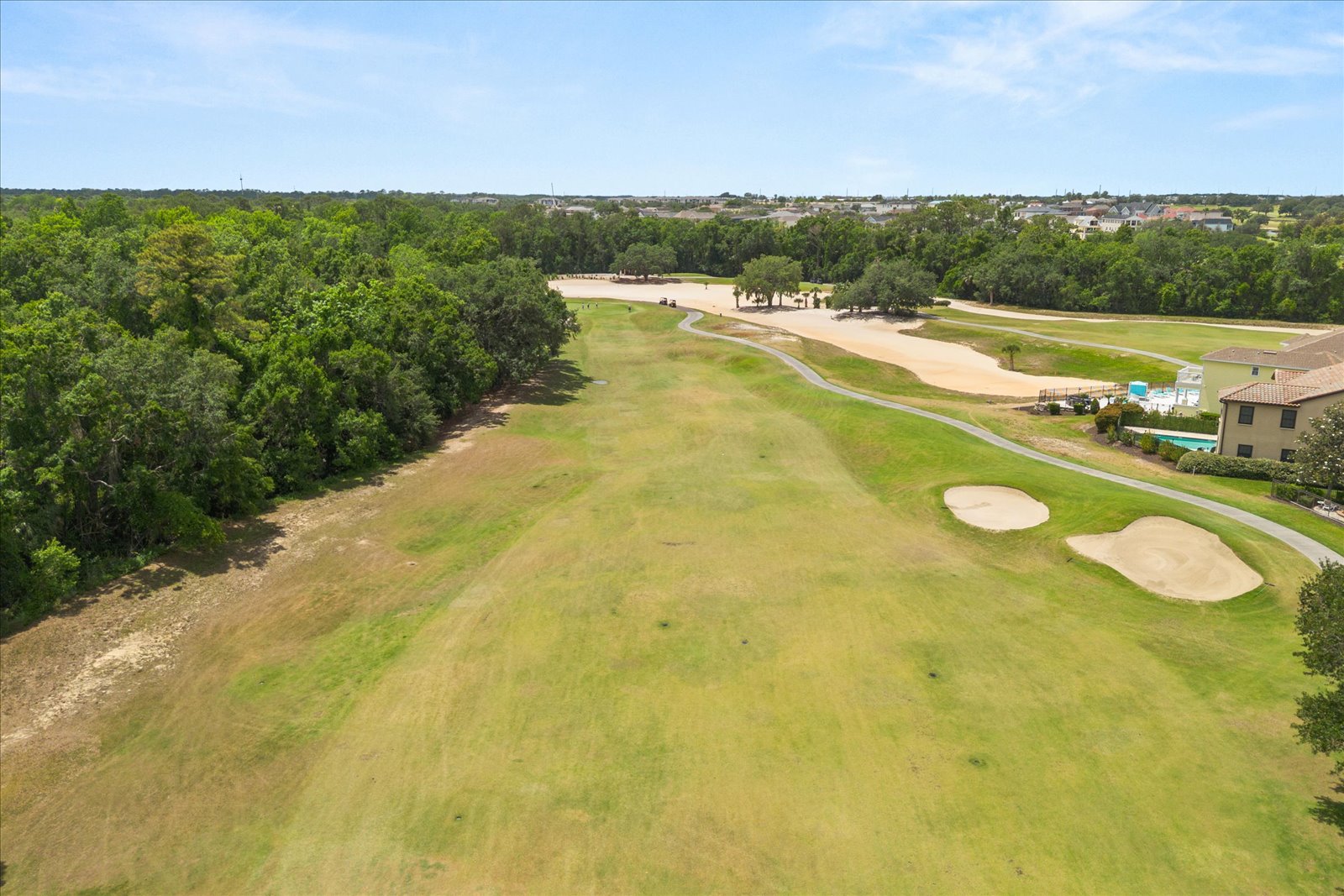 Aerial down the golf fairway