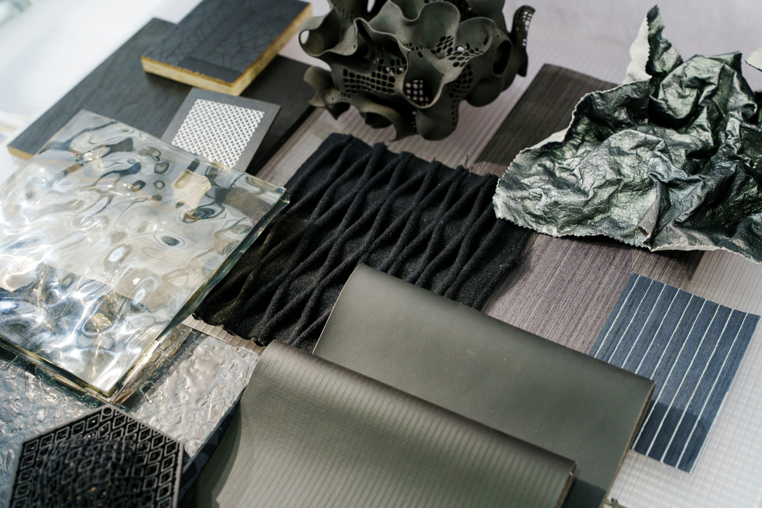 A material palette laid out for a Liberty home — glass, textile, and finish swatches