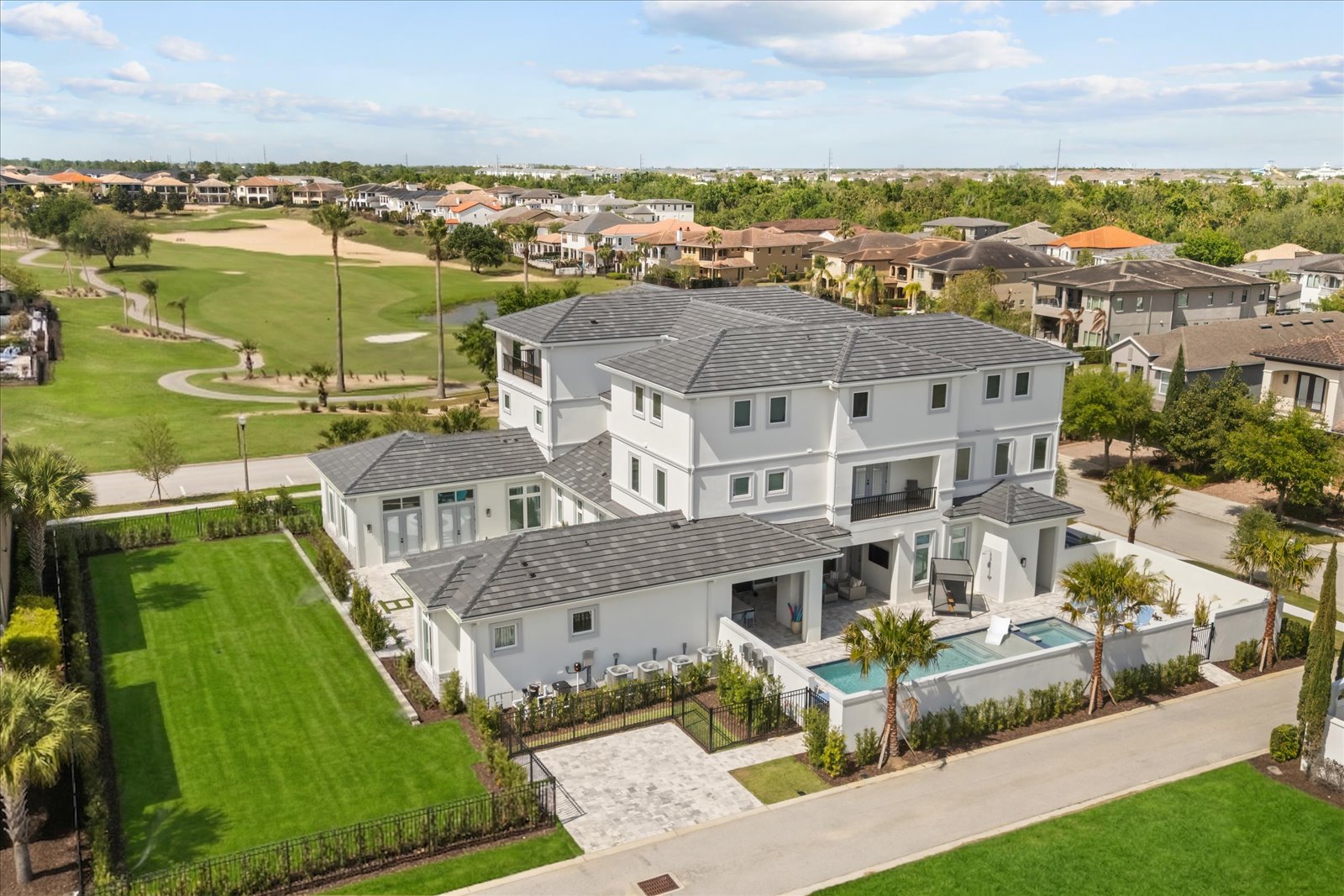Whitemarsh Way — golf-front estate from the air, courtyard and fairway beyond