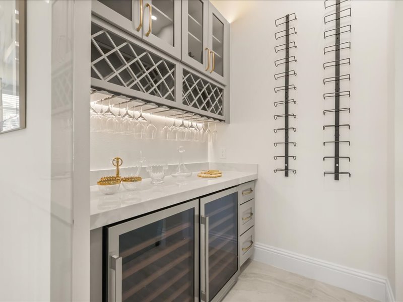 Bar and lit wine wall off the main living floor