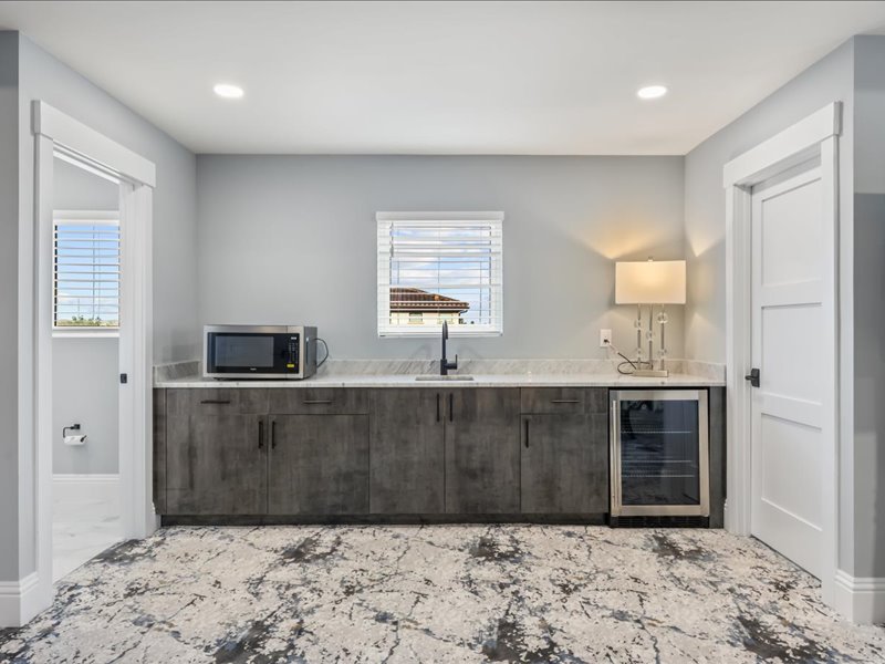 Wet bar and kitchenette serving the resort floor